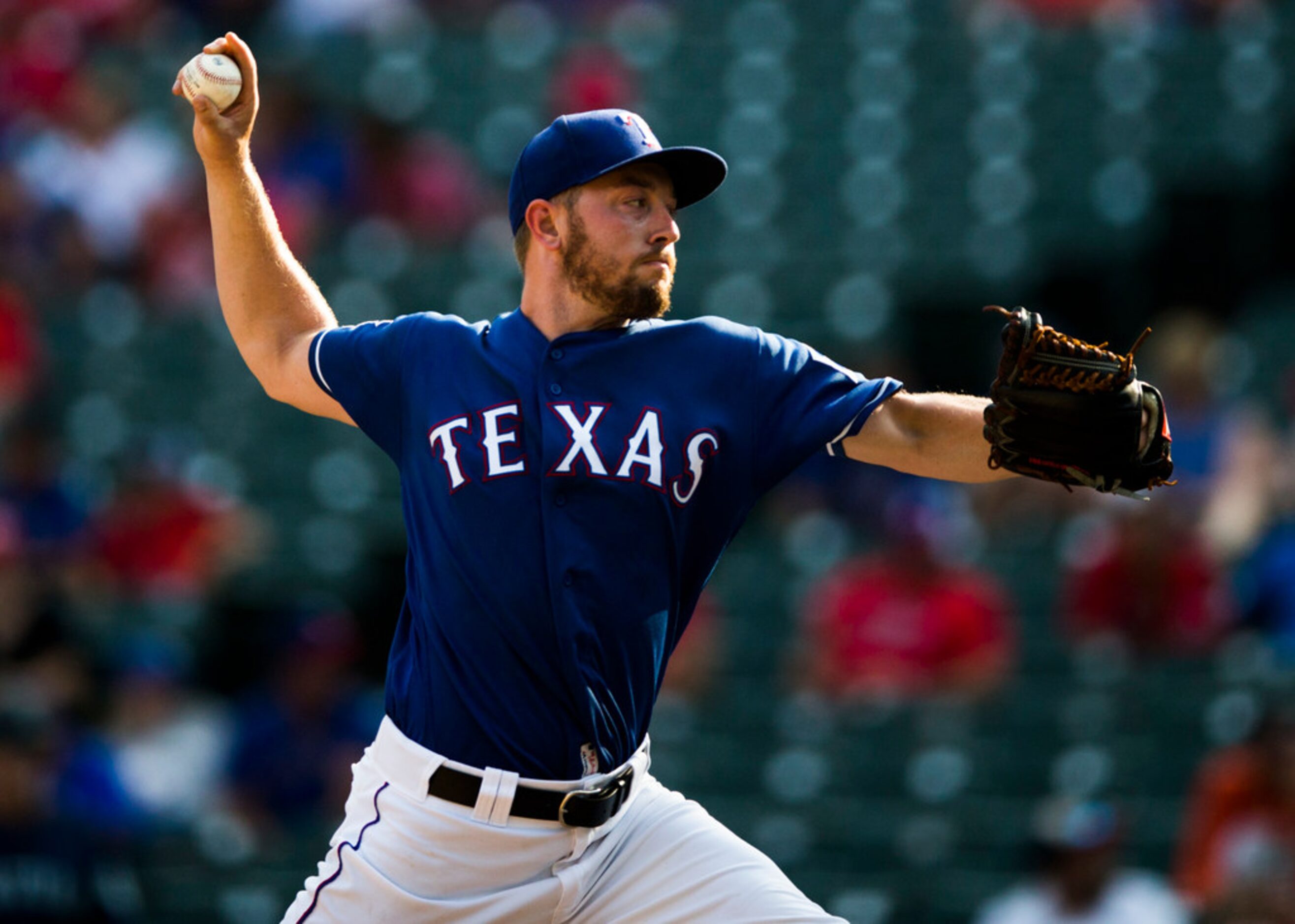 Texas Rangers relief pitcher Adrian Sampson (52) pitches during the ninth inning of an MLB...