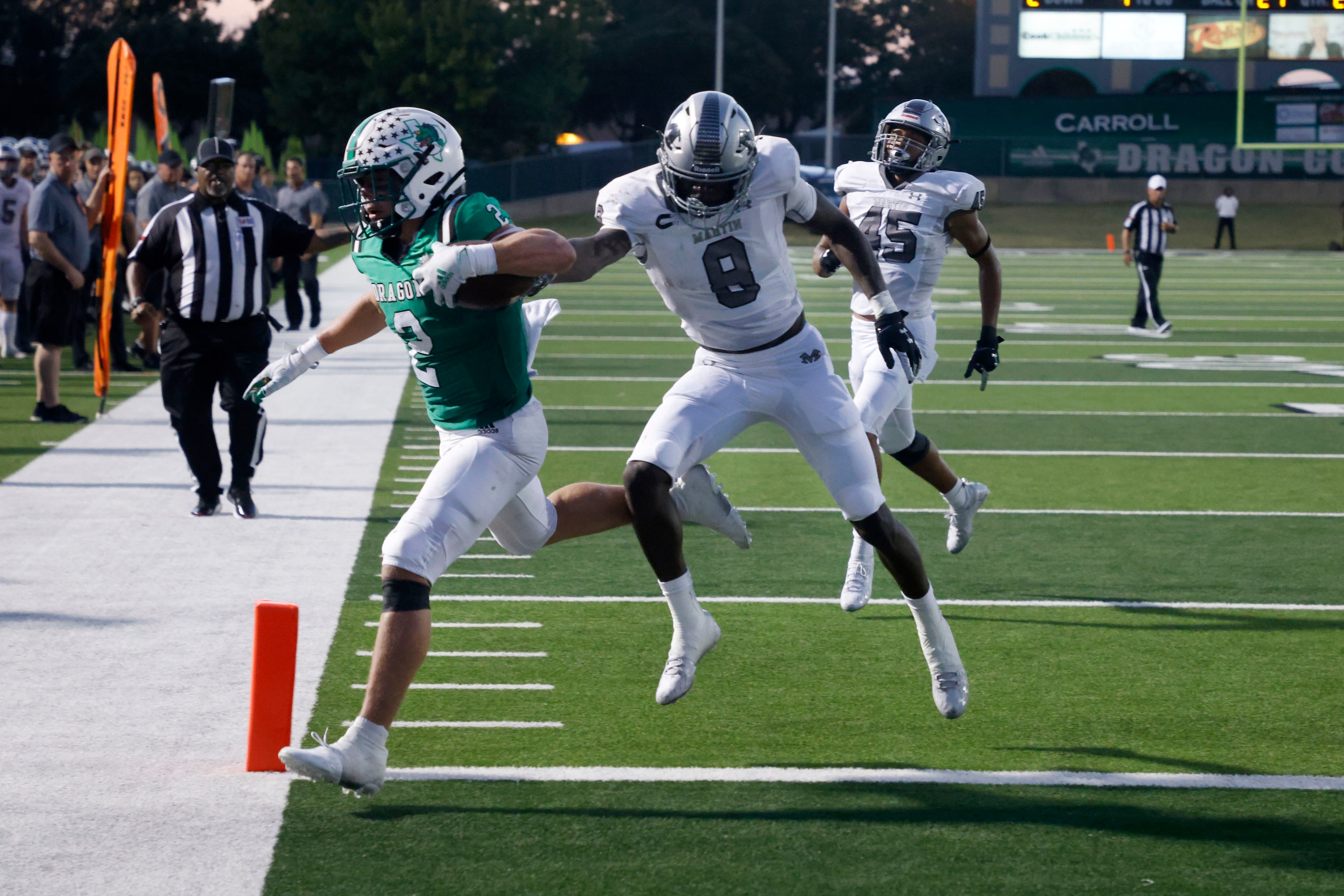 Southlake Carroll running back Owen Allen (2) scores a touchdown in front of Arlington...