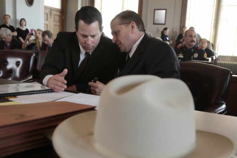Lee Harvey Oswald, portrayed by Cameron Cox, consults with attorney Toby Shook during a mock...
