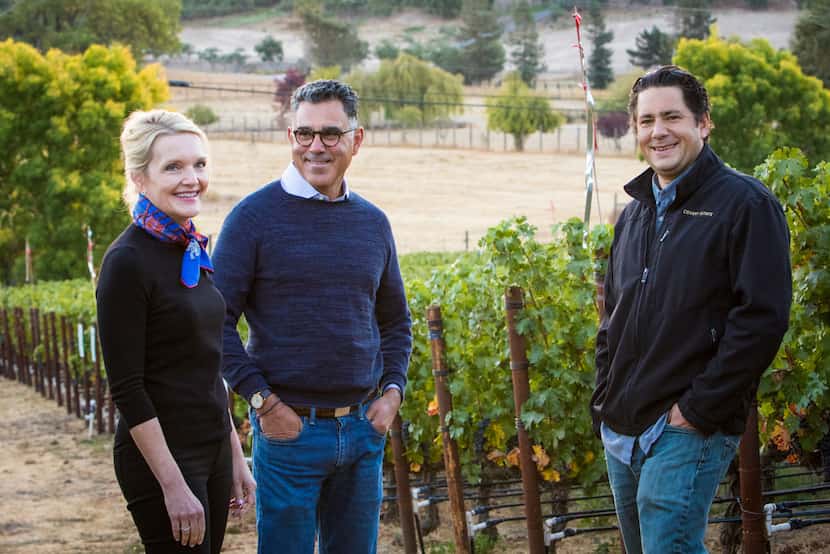 Margaret and Joe Valenzuela (at left), the owners of Rubia Wine Cellars, stand in one of the...