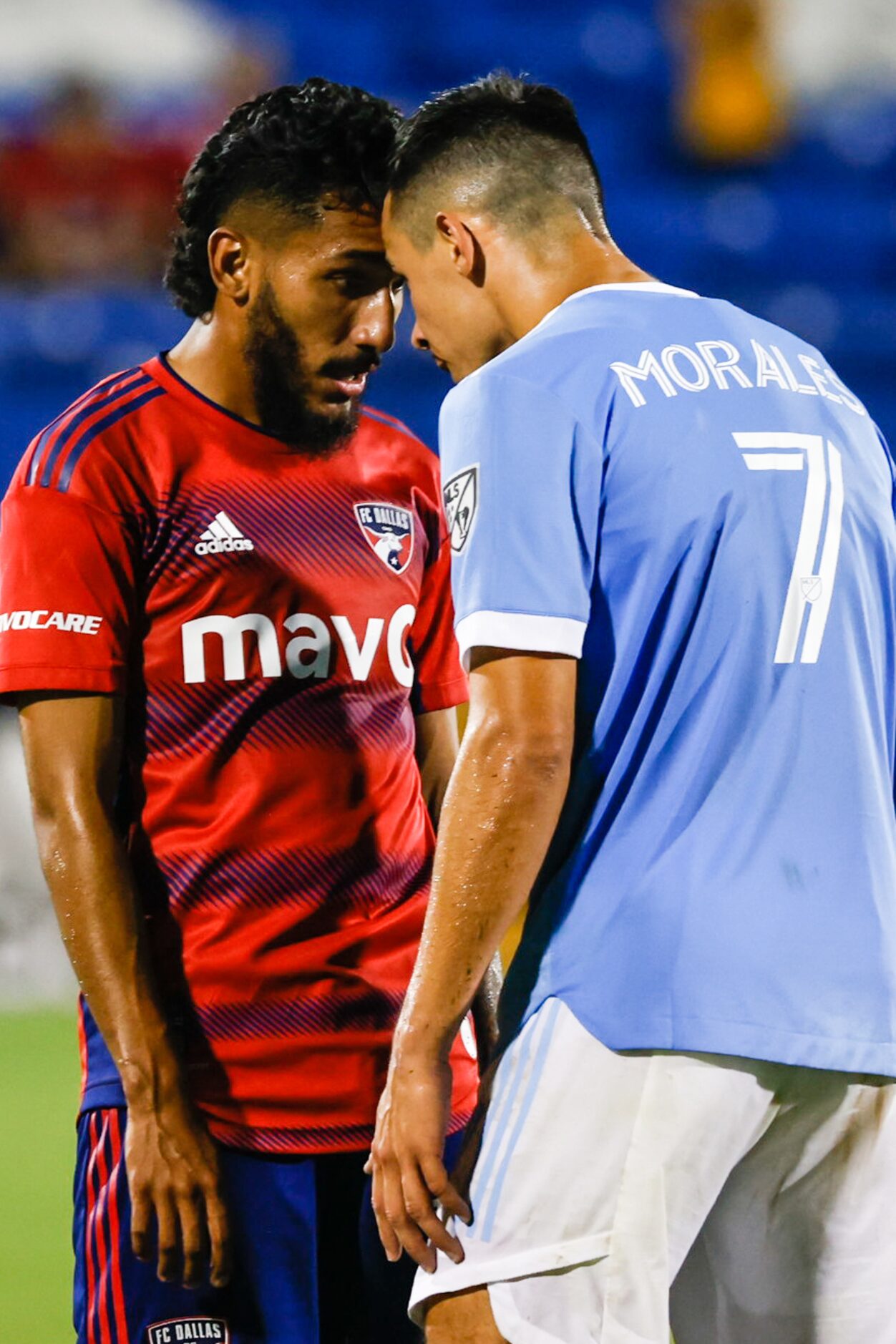 FC Dallas forward Jesús Ferreira (10) and New York City midfielder Alfredo Morales (7) gets...