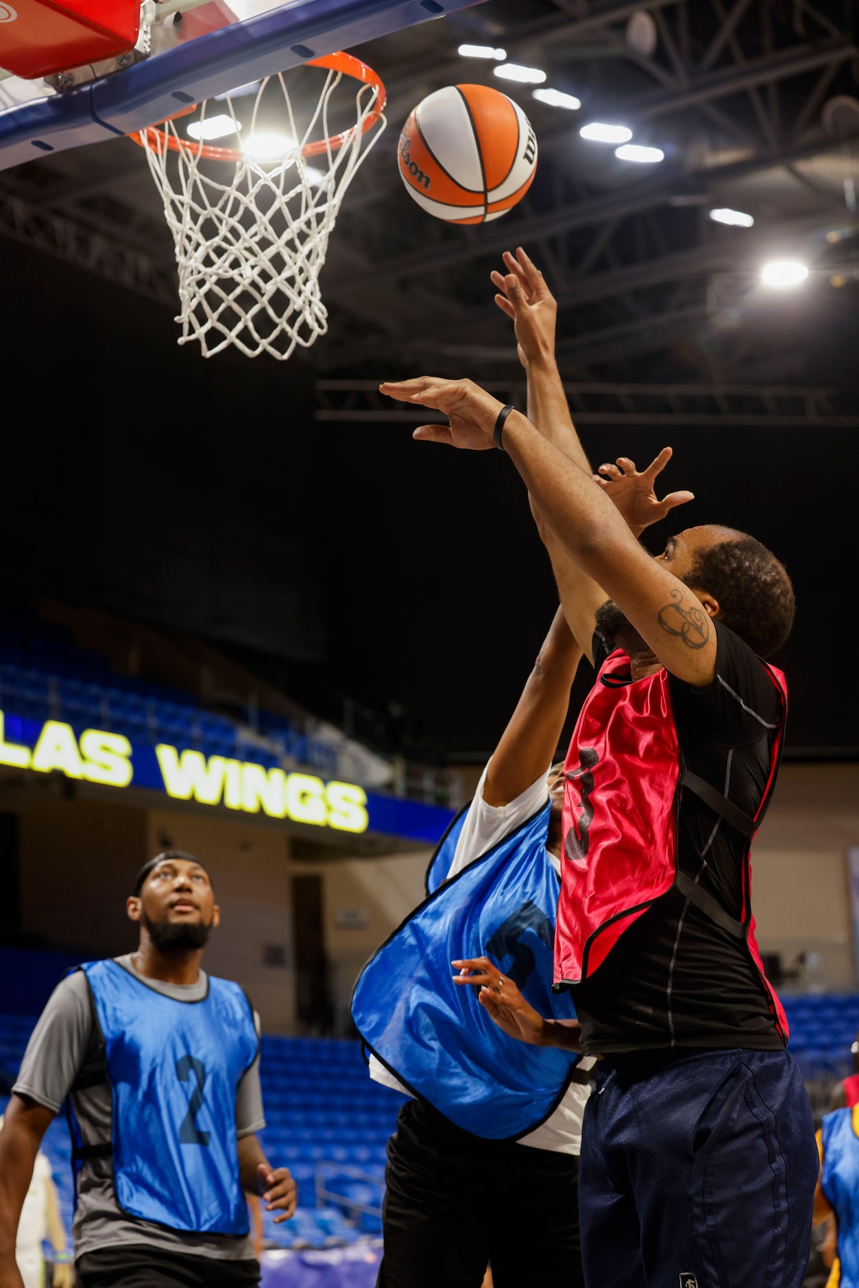 Team Marina’s Brian Bouyer (3) makes a shot against Team Arike during the Unified Game...