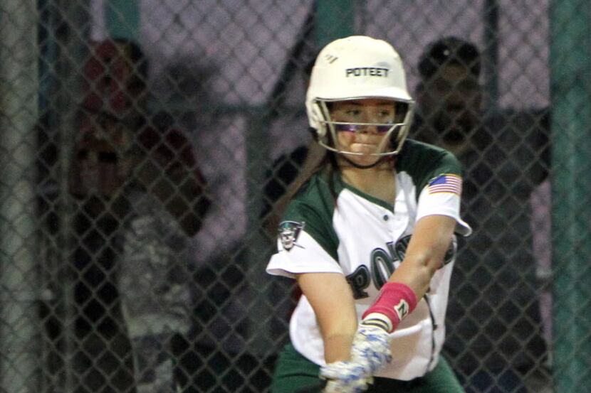 Mesquite Poteet's Aubree Turbeville (23) prepares to drive a pitch during fourth inning...