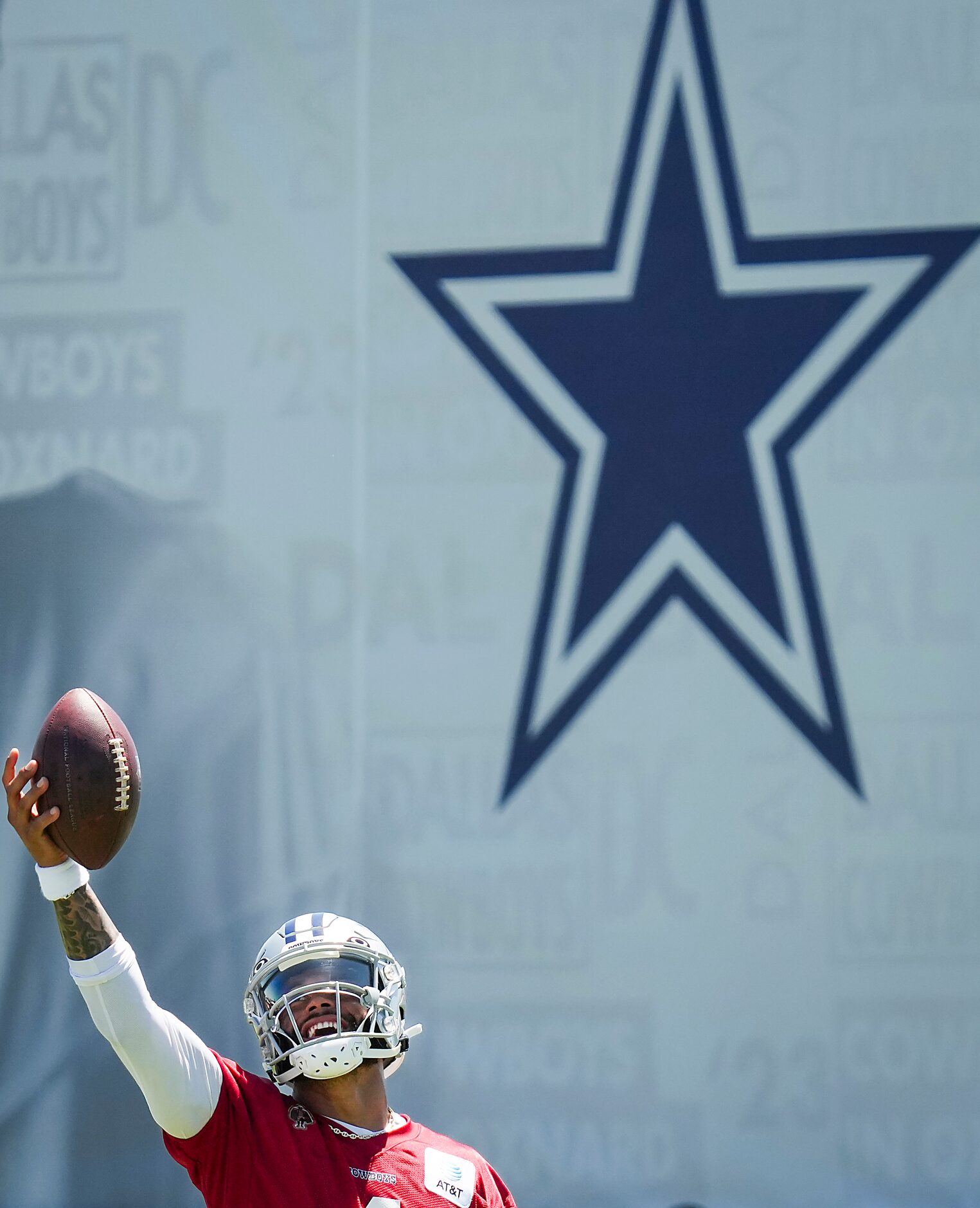 Dallas Cowboys quarterback Dak Prescott catches a ball during a training camp practice on...