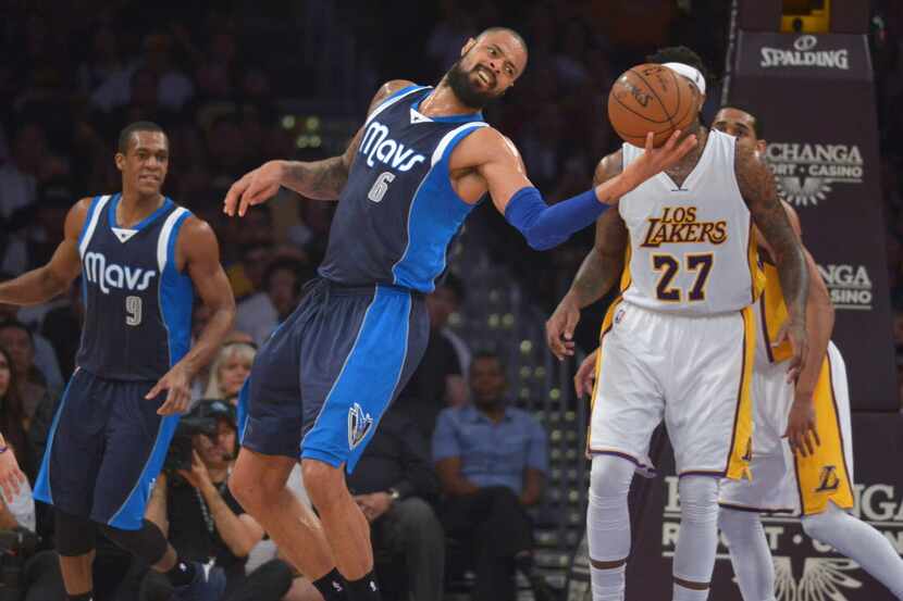 Mar 8, 2015; Los Angeles, CA, USA; Dallas Mavericks center Tyson Chandler (6) reaches for...