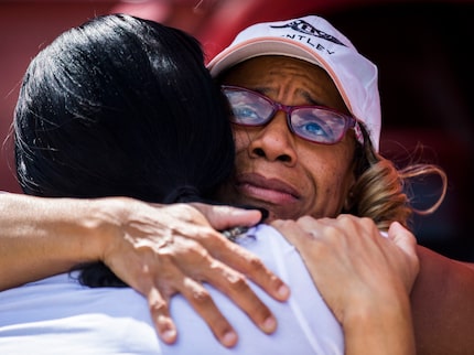 Pamala Burch (right) thanks Kiyundra Gulley, president of the Oak Cliff Chamber of Commerce,...