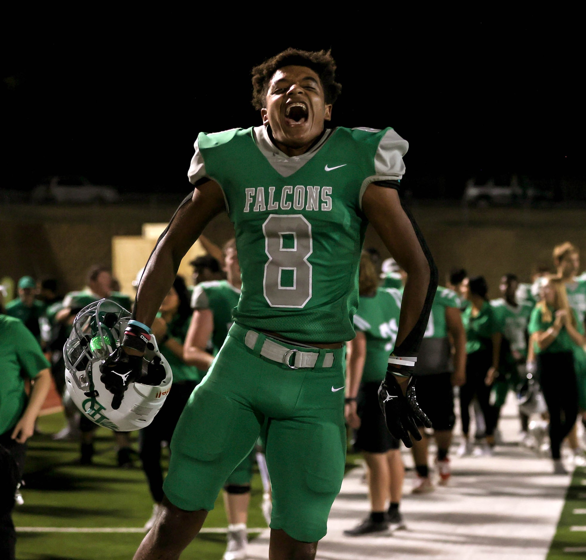 Lake Dallas defensive back Javon Washington celebrates a victory over Frisco Memorial, 54-48...