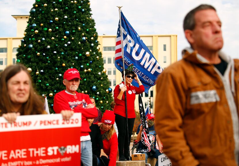 Demonstrators at the Texas GOP's rally at Dallas City Hall on Saturday brought concerns...