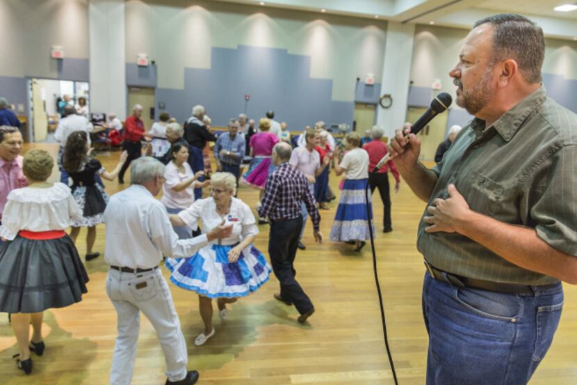 Vernon Jones calls the dance at the Dixie Chainers Square and Round Dance Club at the senior...
