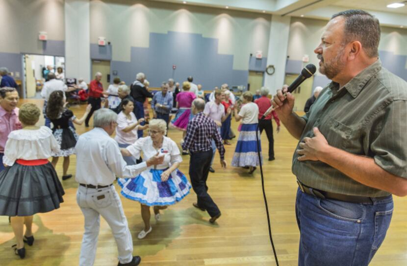 Vernon Jones calls the dance at the Dixie Chainers Square and Round Dance Club at the senior...