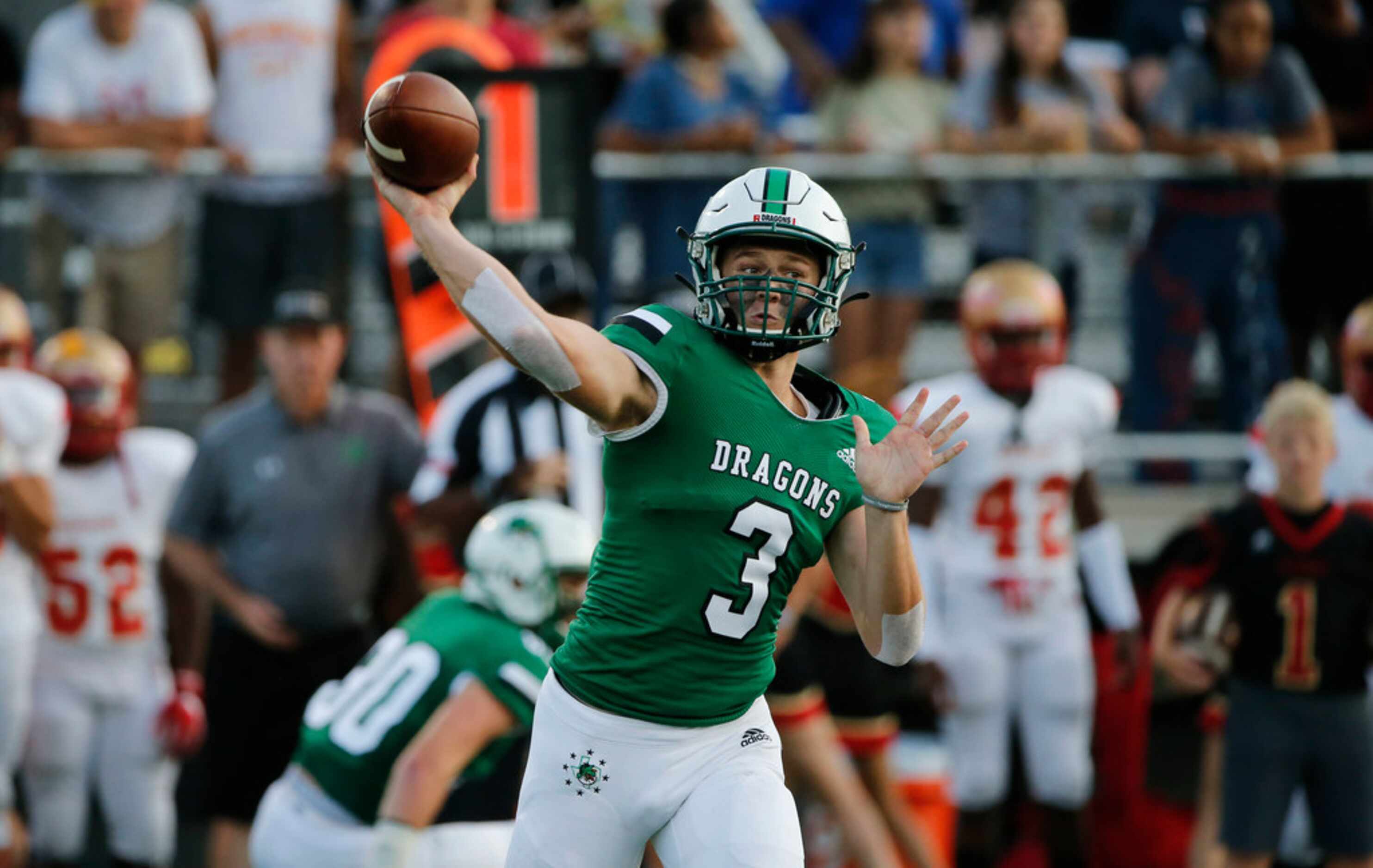 Southlake Carroll quarterback Quinn Ewers (3) throws a pass against South Grand Prairie...