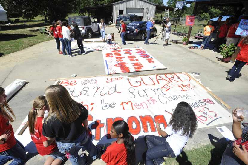 Kountze cheerleaders, friends and supportive parents who are standing up for their kids and...