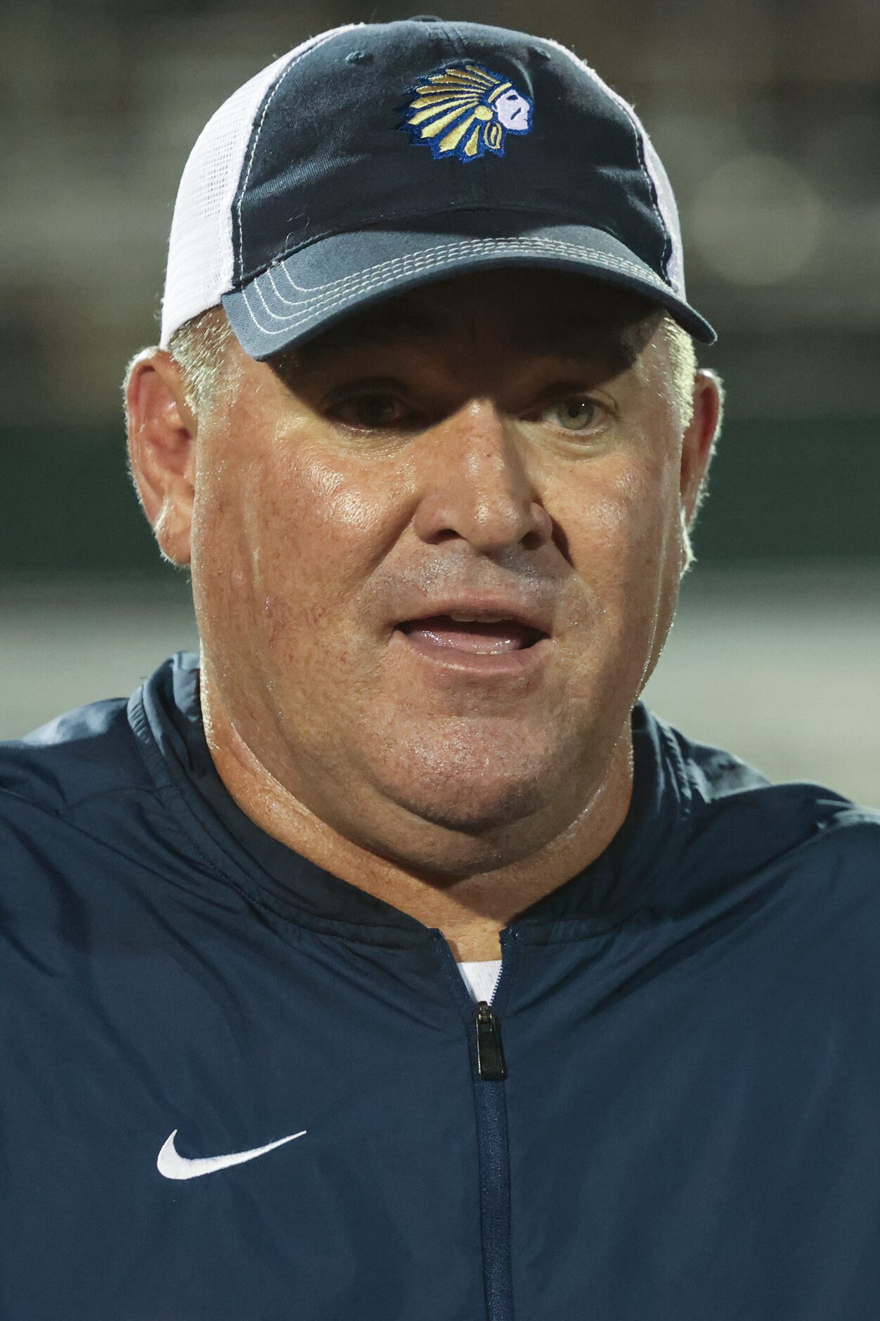 Keller High School head coach Carl Stralow talks to the team after the game against Plano...