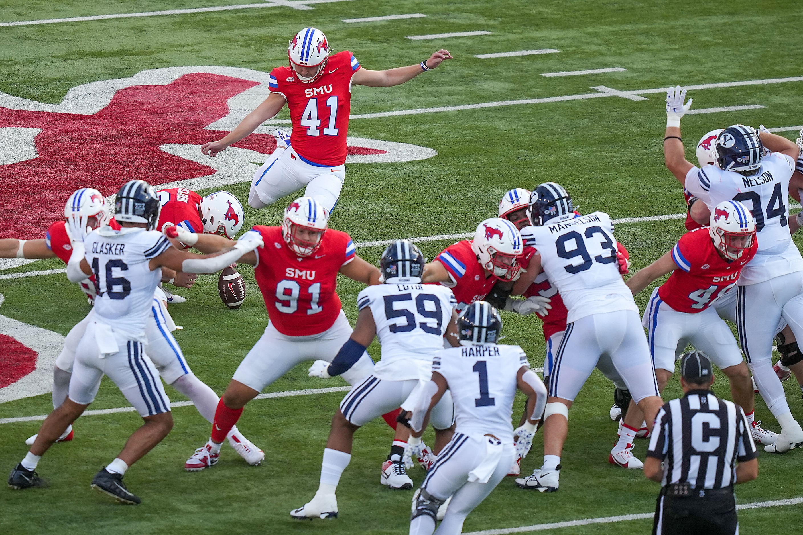 SMU place kicker Collin Rogers (41) kicks a field goal during the first half of an NCAA...