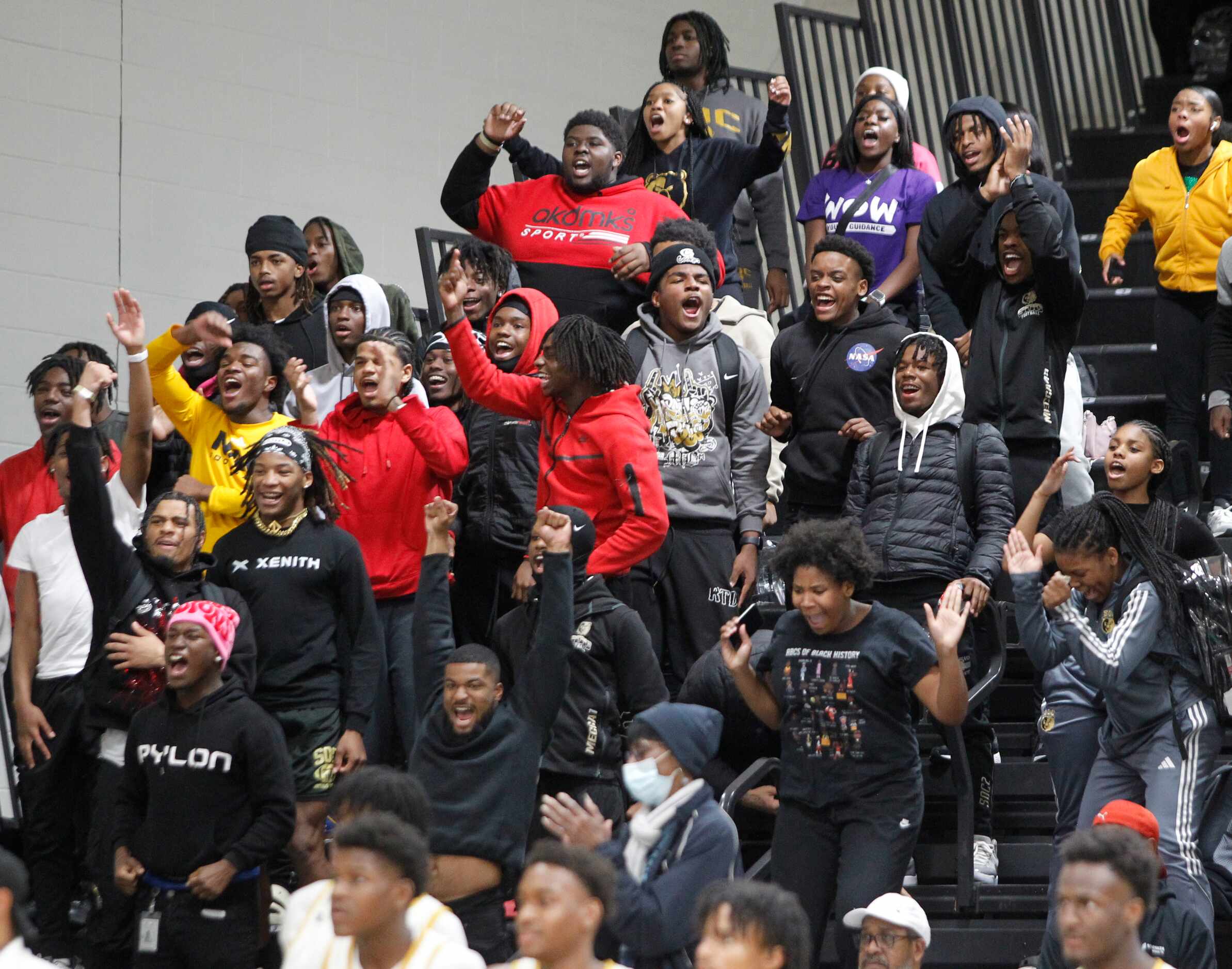South Oak Cliff fans react after a score late in the fourth quarter of their 53-50 victory...