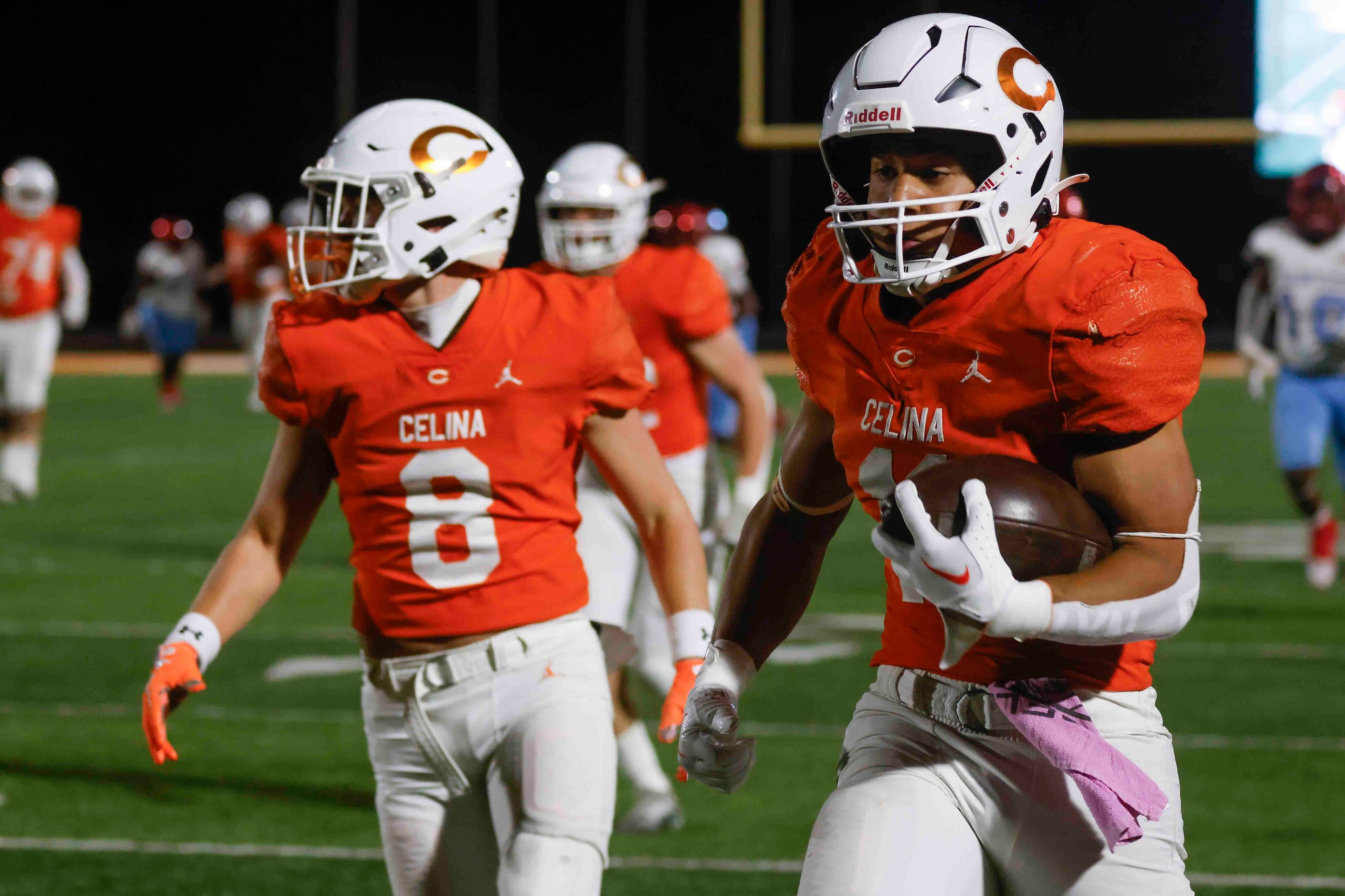 Celina High School’s Gabe Gayton (11) competes a touchdown against David W. Carter High...