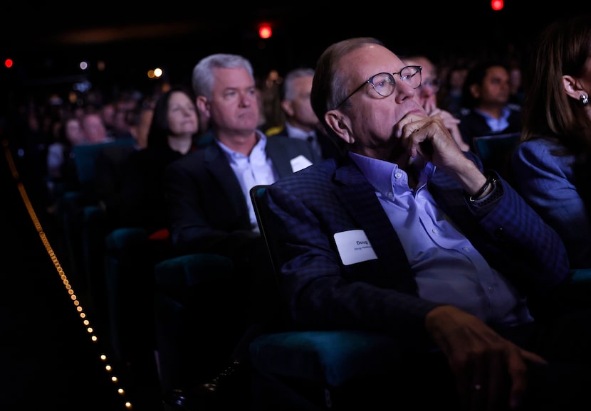 Doug Hawthorne listens to Federal Reserve Chair Jerome Powell answer some questions from...