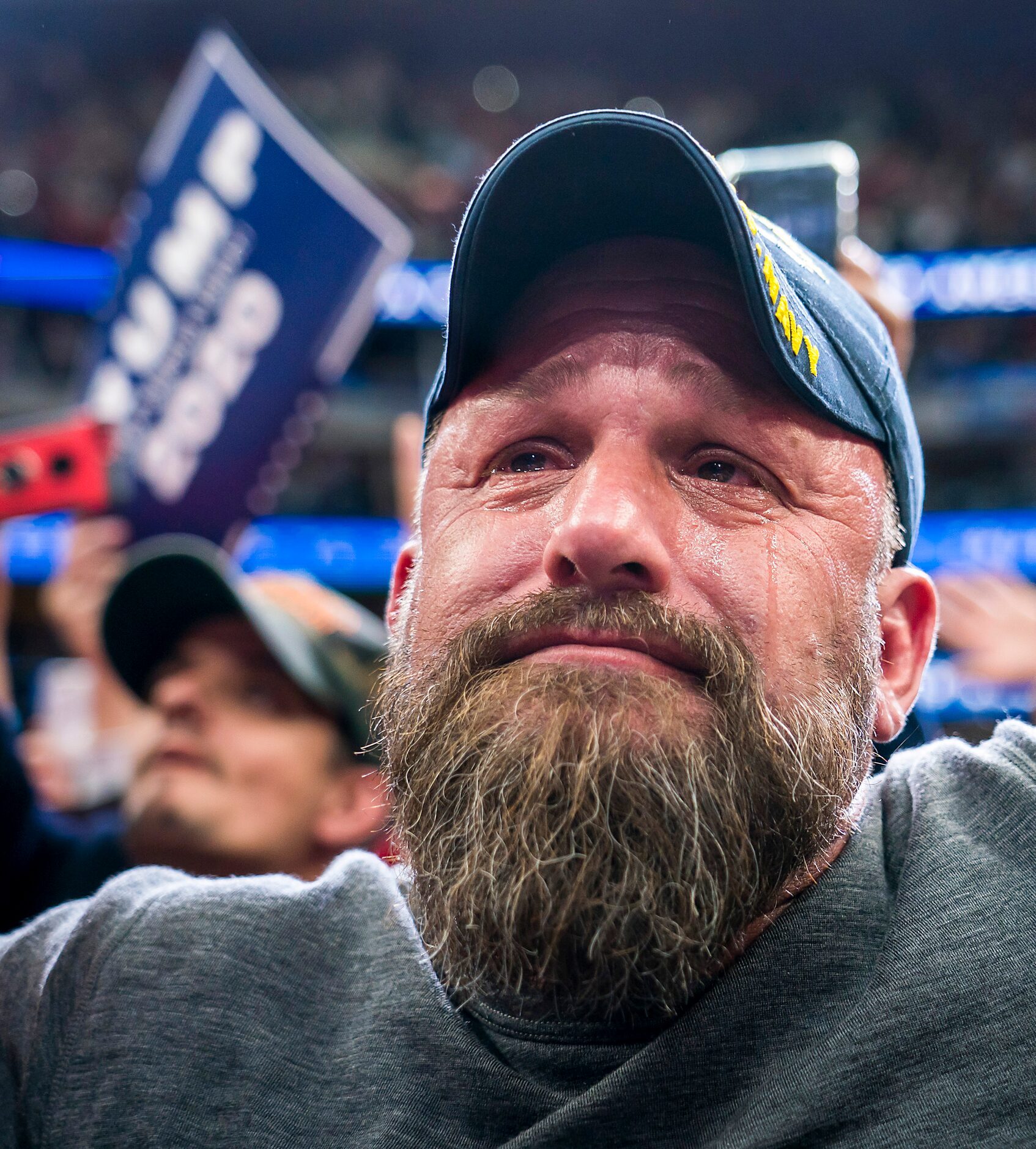 Navy Veteran Jase Wheeler of Flower Mound tears up as President Donald Trump speaks during a...