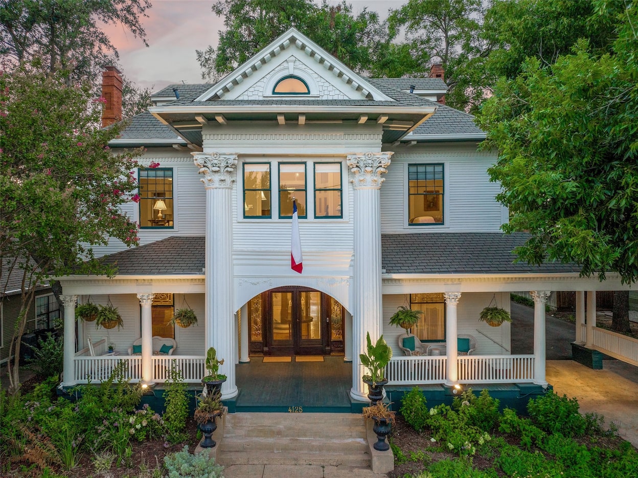 Exterior of a Victorian home with a picturesque wraparound porch