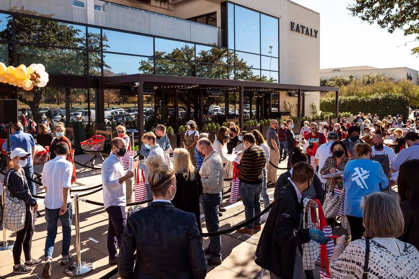 A large crowd outside of Eataly at NorthPark Center as fans and first-timers wait to...
