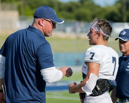 Argyle Liberty Christian head coach Jason Witten talks with a player during a football...