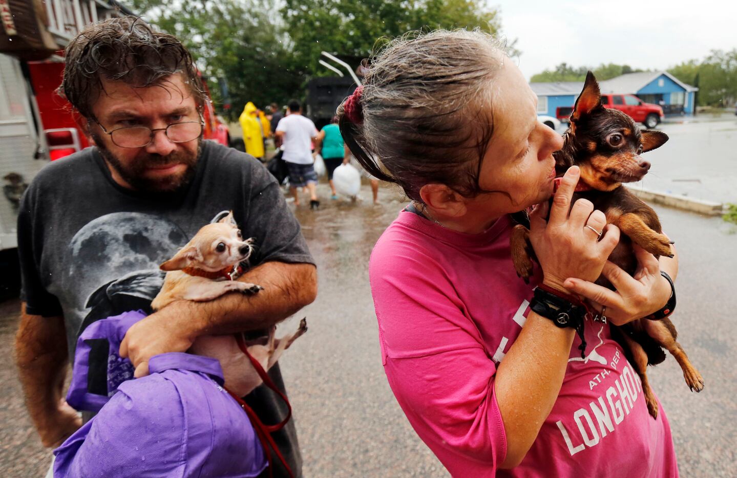 Letha McCraney was grateful that she and her dog, Coco, were rescued from their flooded home...