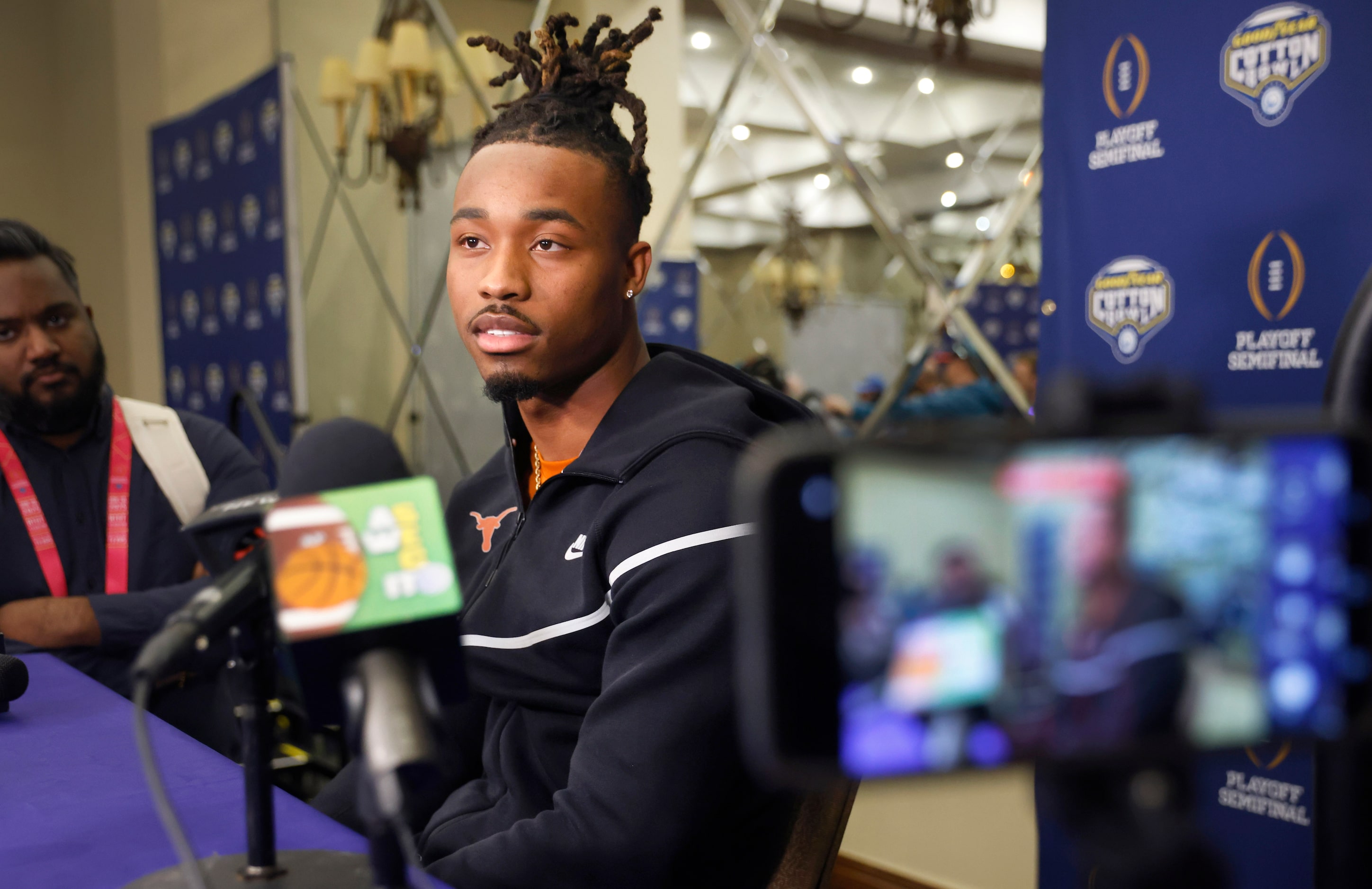 Texas Longhorns defensive back Jahdae Barron answers questions from the media during Cotton...