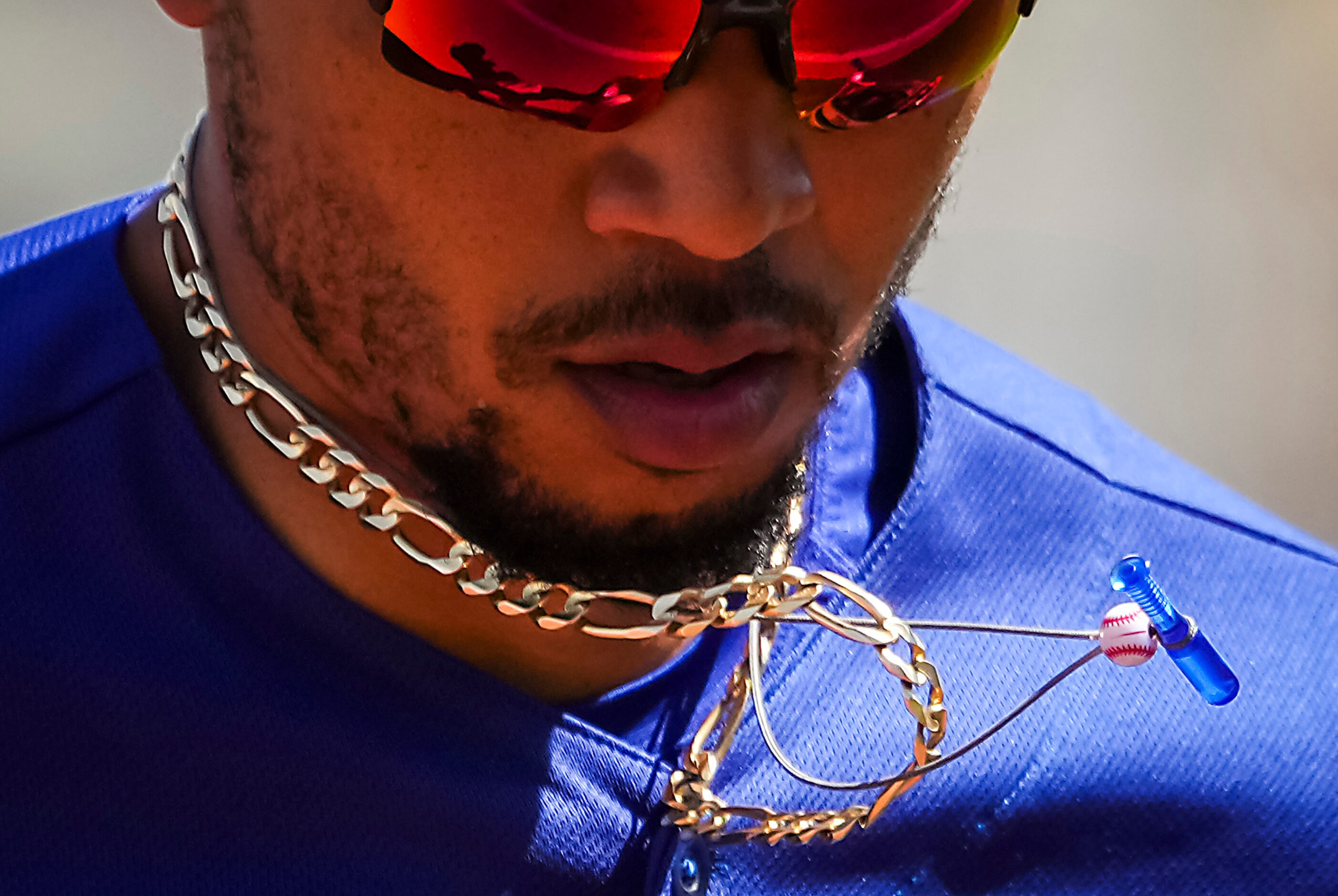 Los Angeles Dodgers right fielder Mookie Betts heads for the dugout during the first inning...