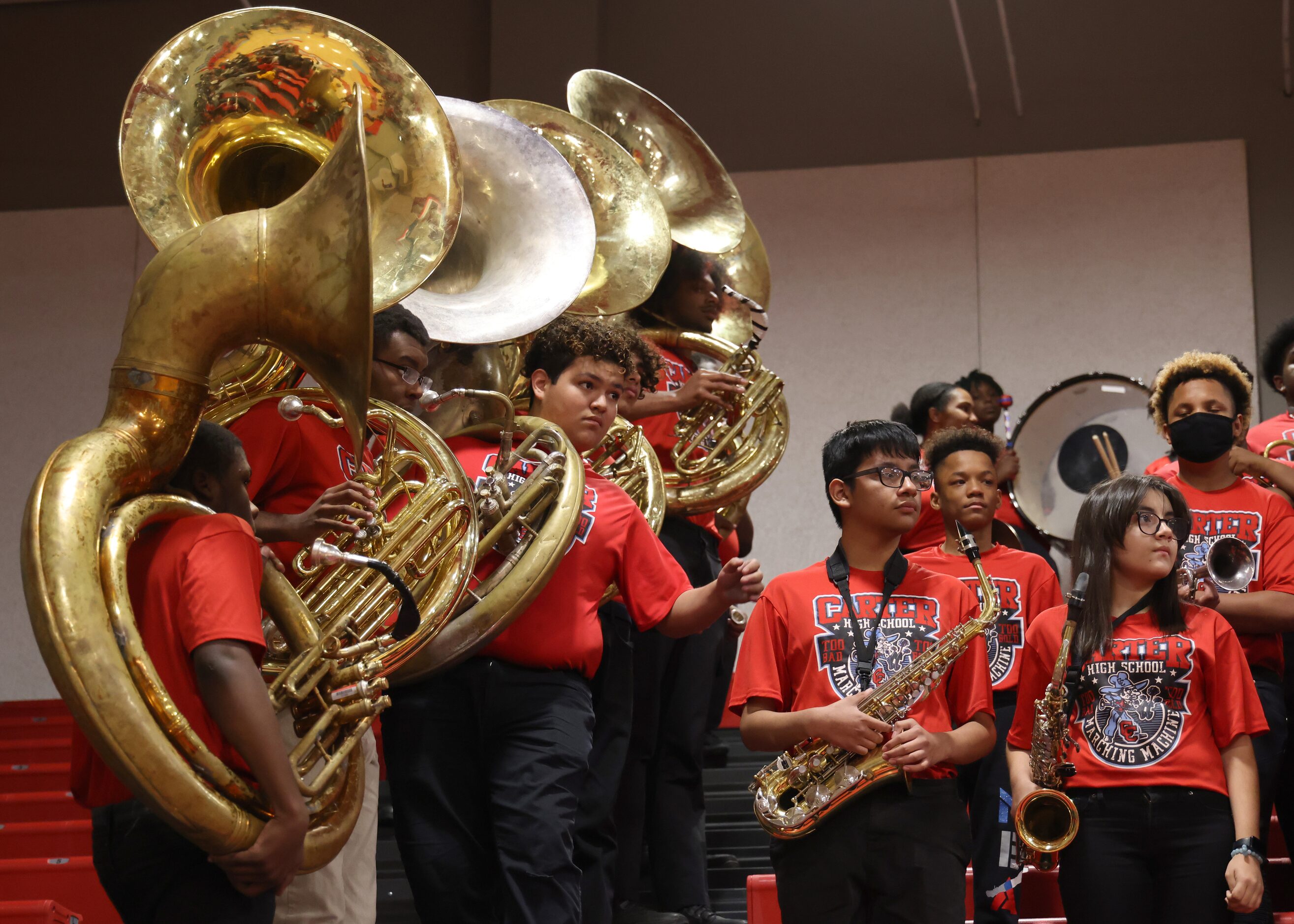 Members of the Dallas Carter band assemble in the stands prior to the start of their game...