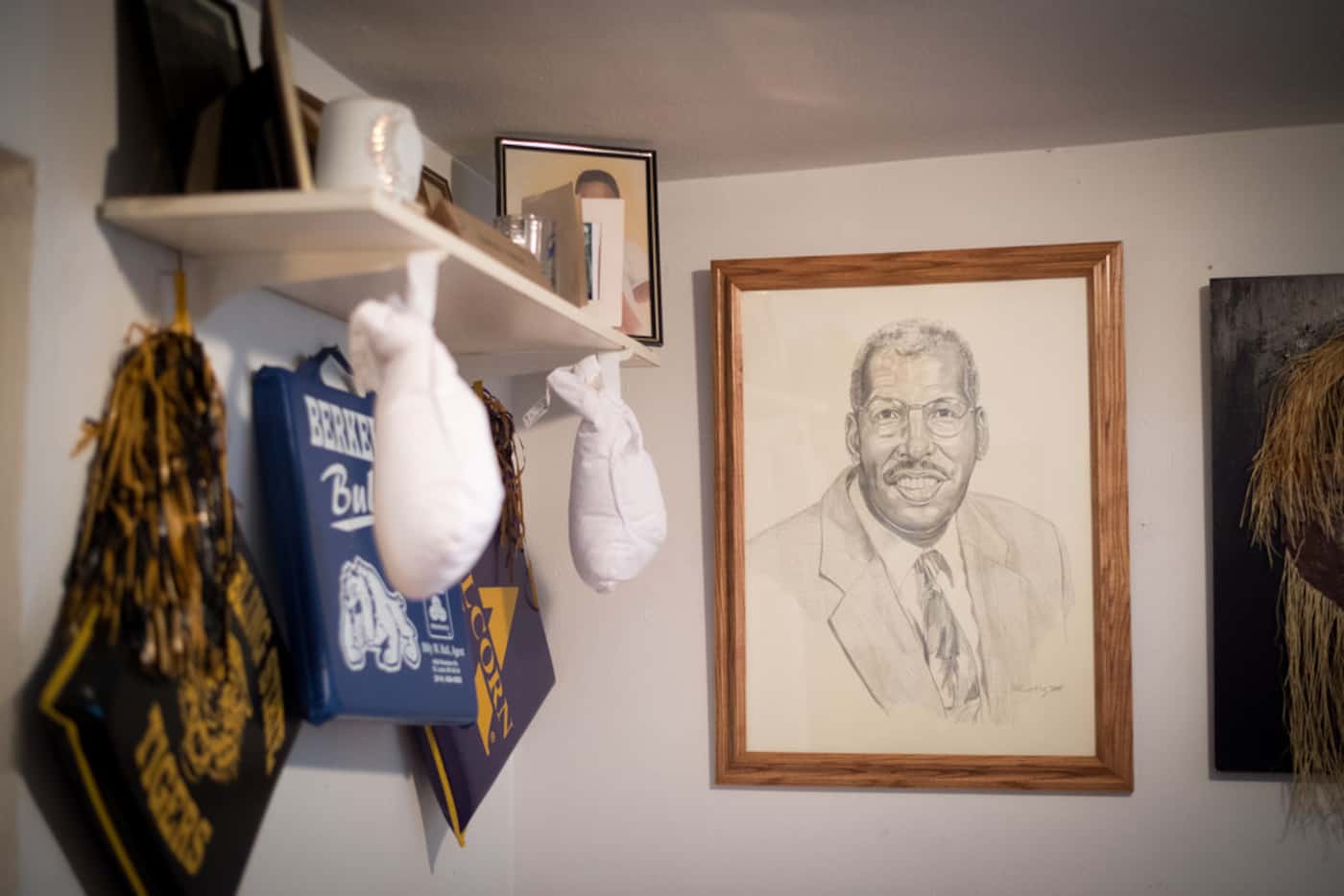 Pictures and artwork depicting Charles Edmond are seen at home of Ruth Edmond in University...