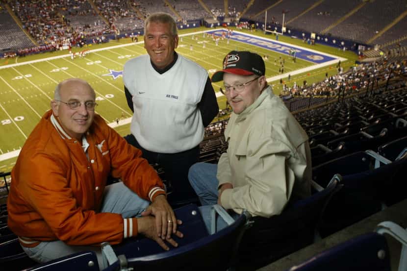From left, Mike Zoffuto, Eddy Clinton and Denny Garver photographed during halftime of the...