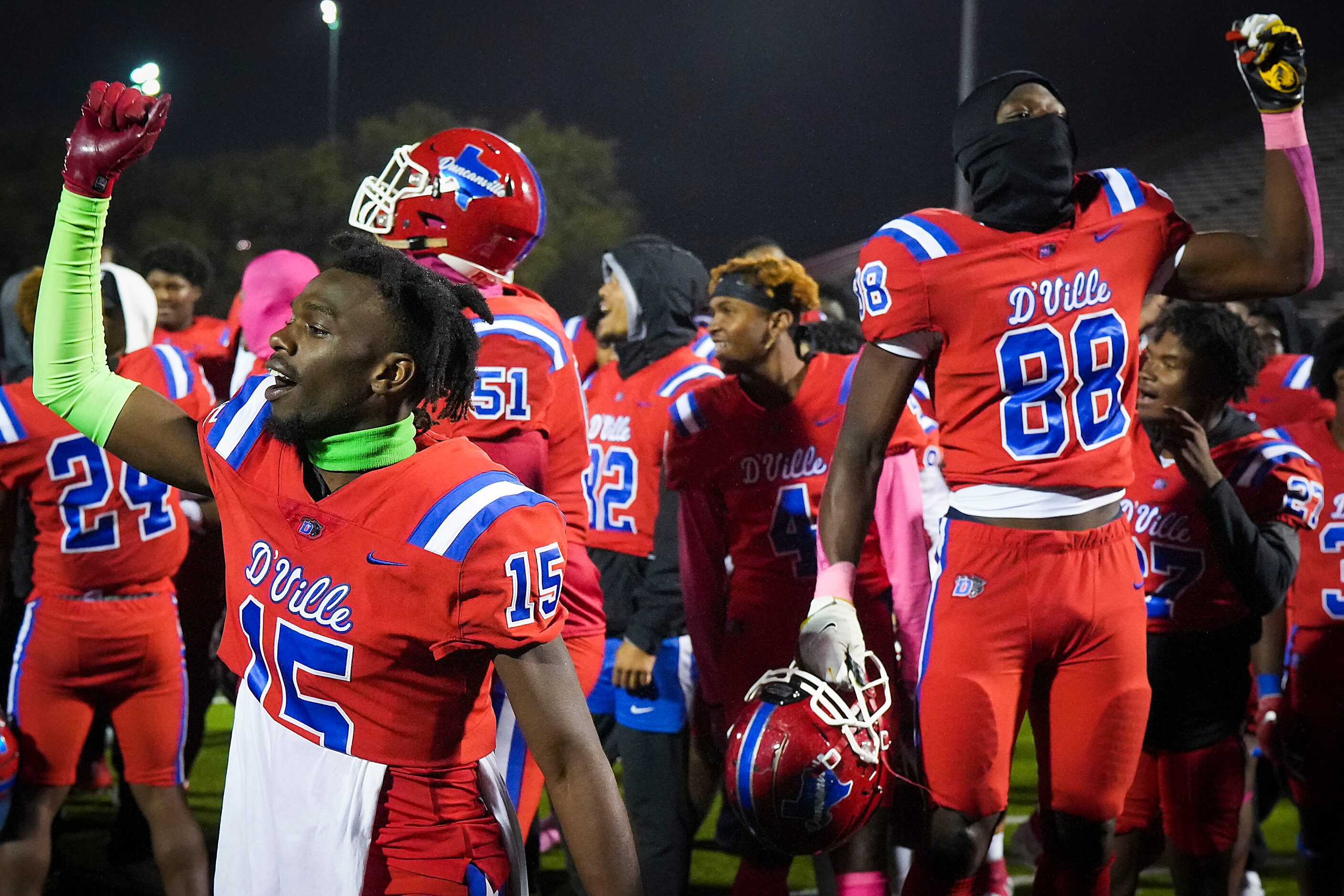 Duncanville defensive back Davion Bluitt (15) and wide receiver Zachery Turner (88)...