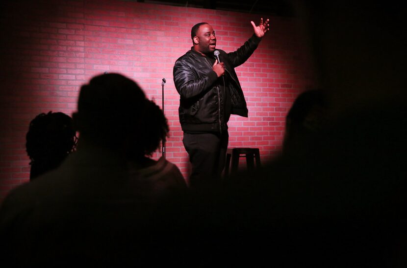 Local comedian Ku Egenti performs during open mike at The Secret Group in Houston on Dec....