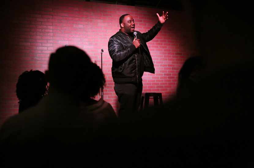 Local comedian Ku Egenti performs during open mike at The Secret Group in Houston on Dec....