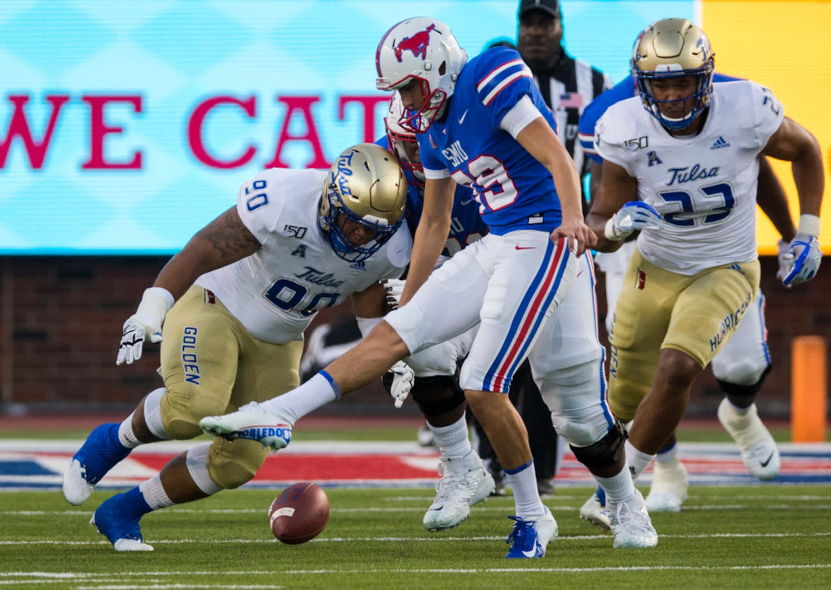 SMU Mustangs place kicker Kevin Robledo (89) tries to move a blocked extra point attempt...