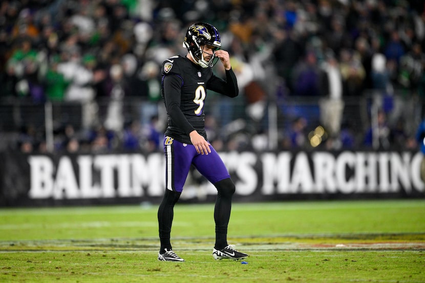 Baltimore Ravens kicker Justin Tucker reacts after missing his second field goal of the...