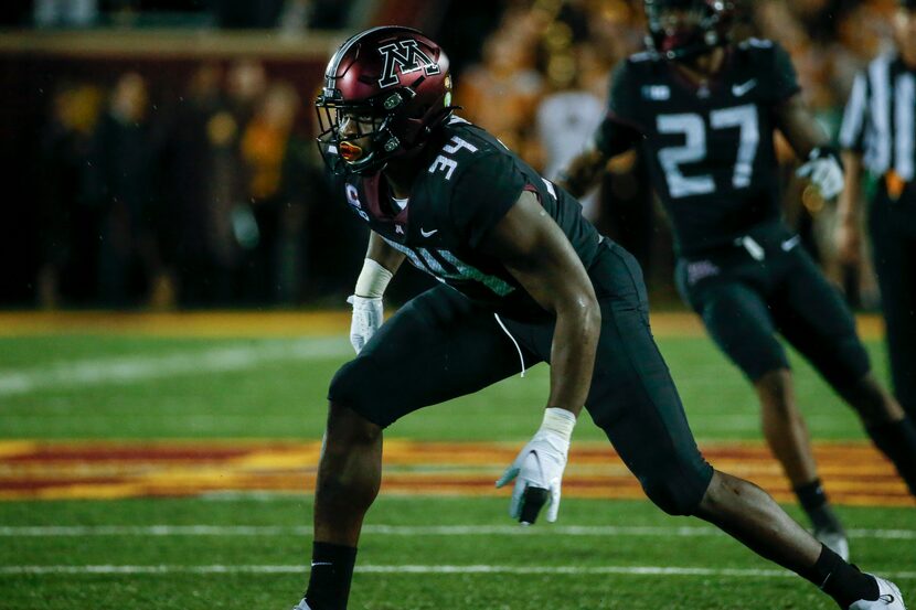 Minnesota defensive lineman Boye Mafe (34) rushes against Ohio State in the third quarter of...