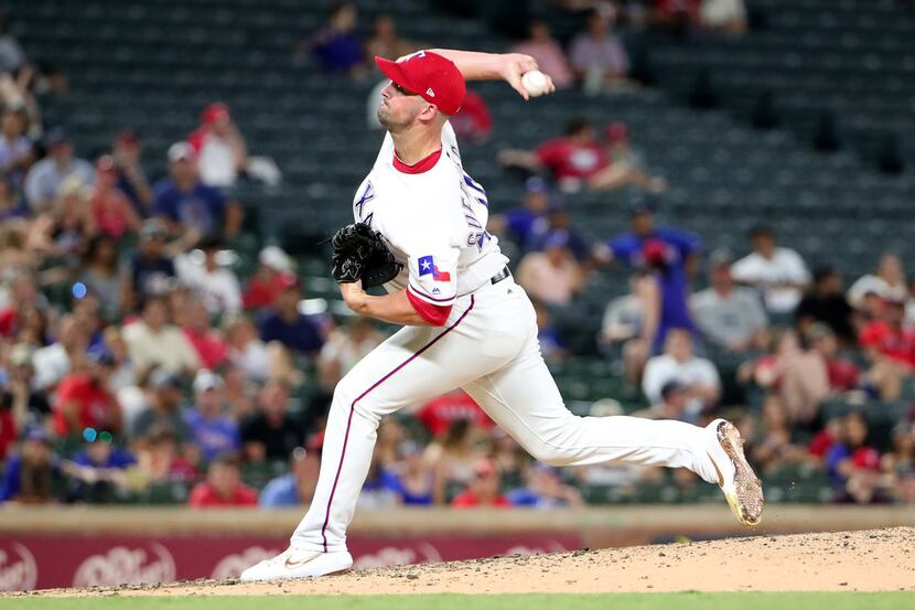 ARLINGTON, TEXAS - JULY 17: Taylor Guerrieri #46 of the Texas Rangers pitches against the...