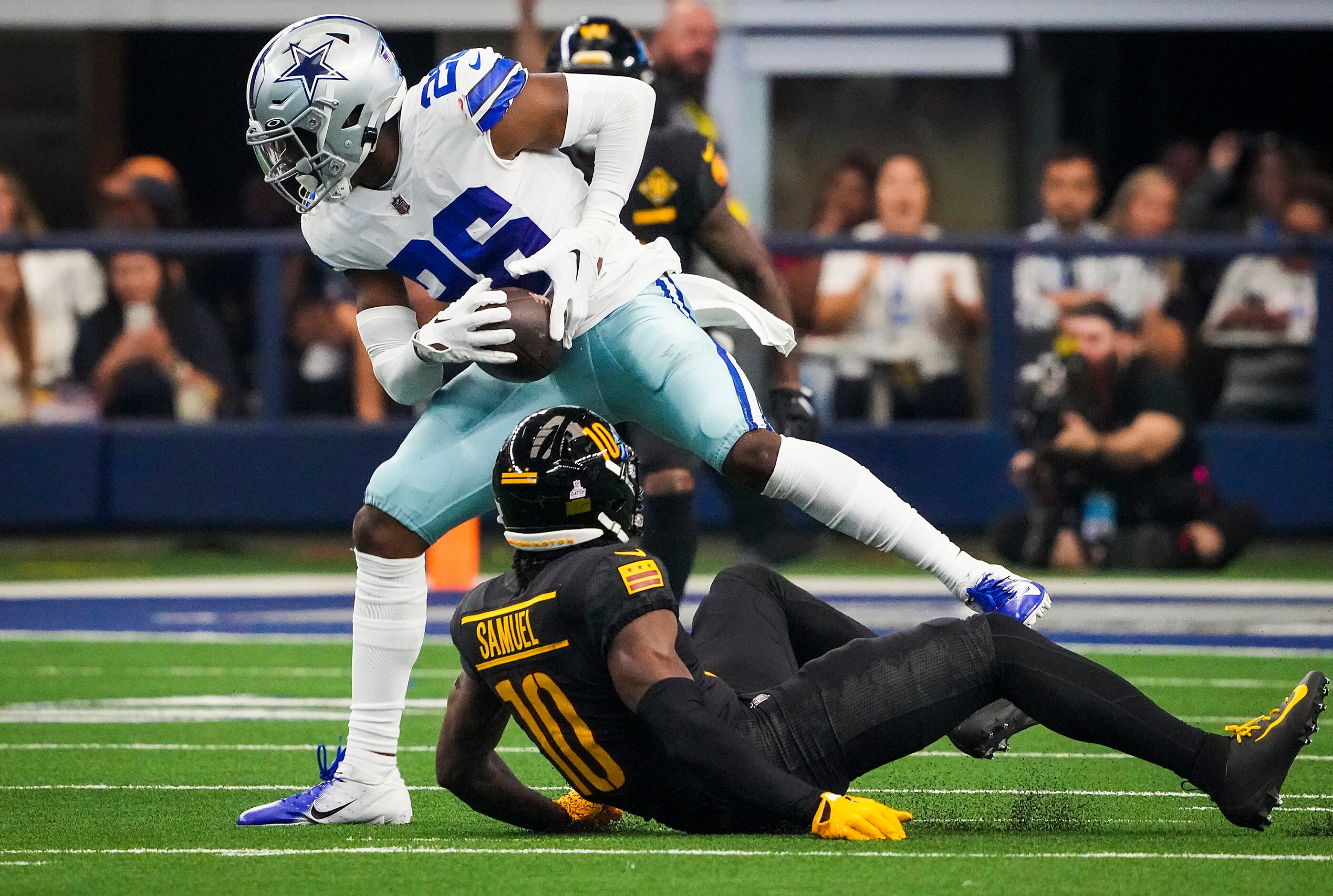 Dallas Cowboys cornerback DaRon Bland (26) intercepts a pass intended for Washington...