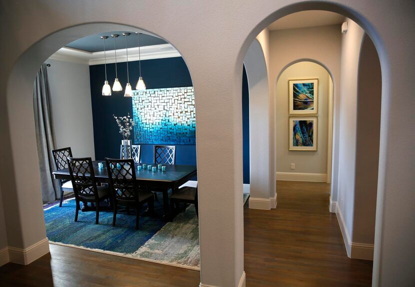 
The formal dining area of the model home of Scott Felder Homes in Highland Village.
