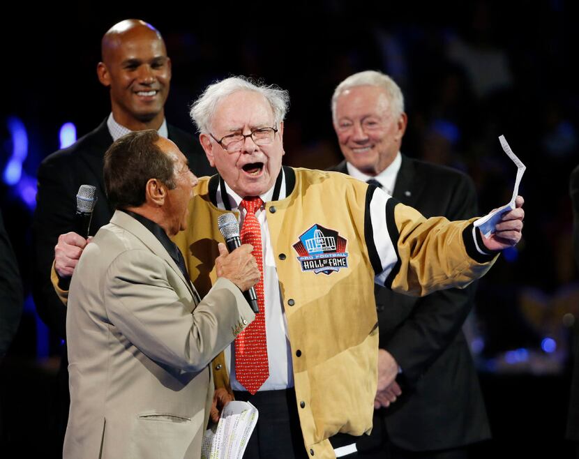 Paul Anka, and Warren Buffett sing a revised version of "My Way," during the Gold Jacket...