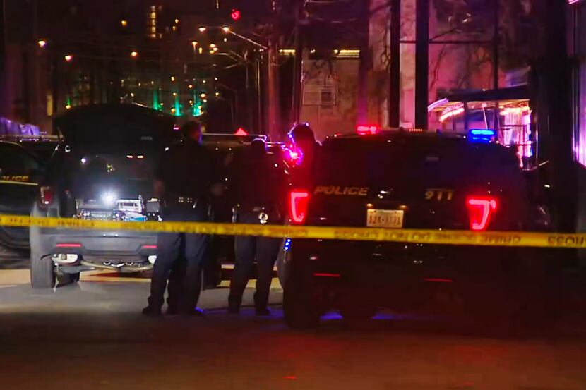 In this image made from video provided by KSAT, San Antonio police officers work the scene...