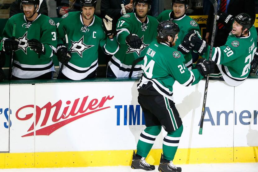 DALLAS, TX - JANUARY 21:  Jordie Benn #24 of the Dallas Stars celebrates with his team after...
