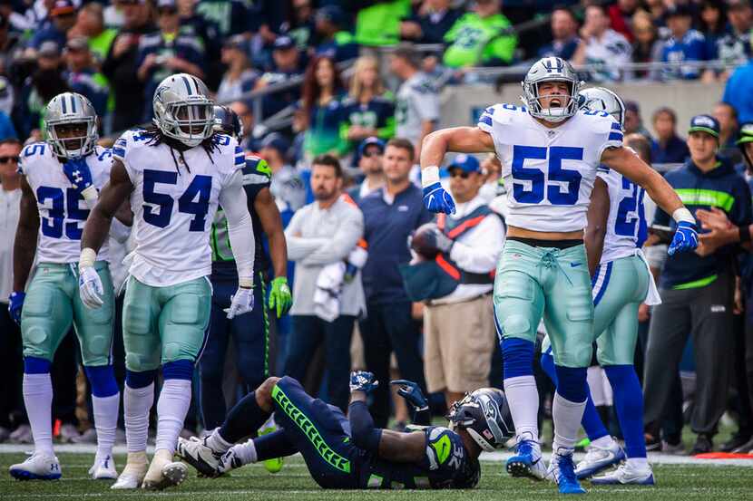 Dallas Cowboys linebacker Leighton Vander Esch (55) celebrates after bringing down Seattle...