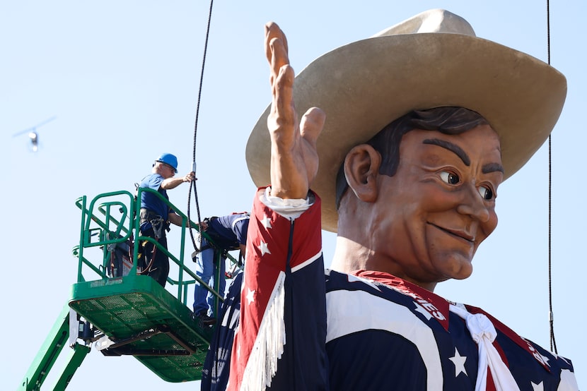 Big Tex, the 55-foot-tall symbol of the State Fair of Texas, gets installed, on Friday,...