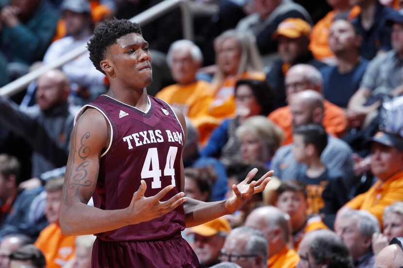 KNOXVILLE, TN - JANUARY 13: Robert Williams #44 of the Texas A&M Aggies reacts after being...