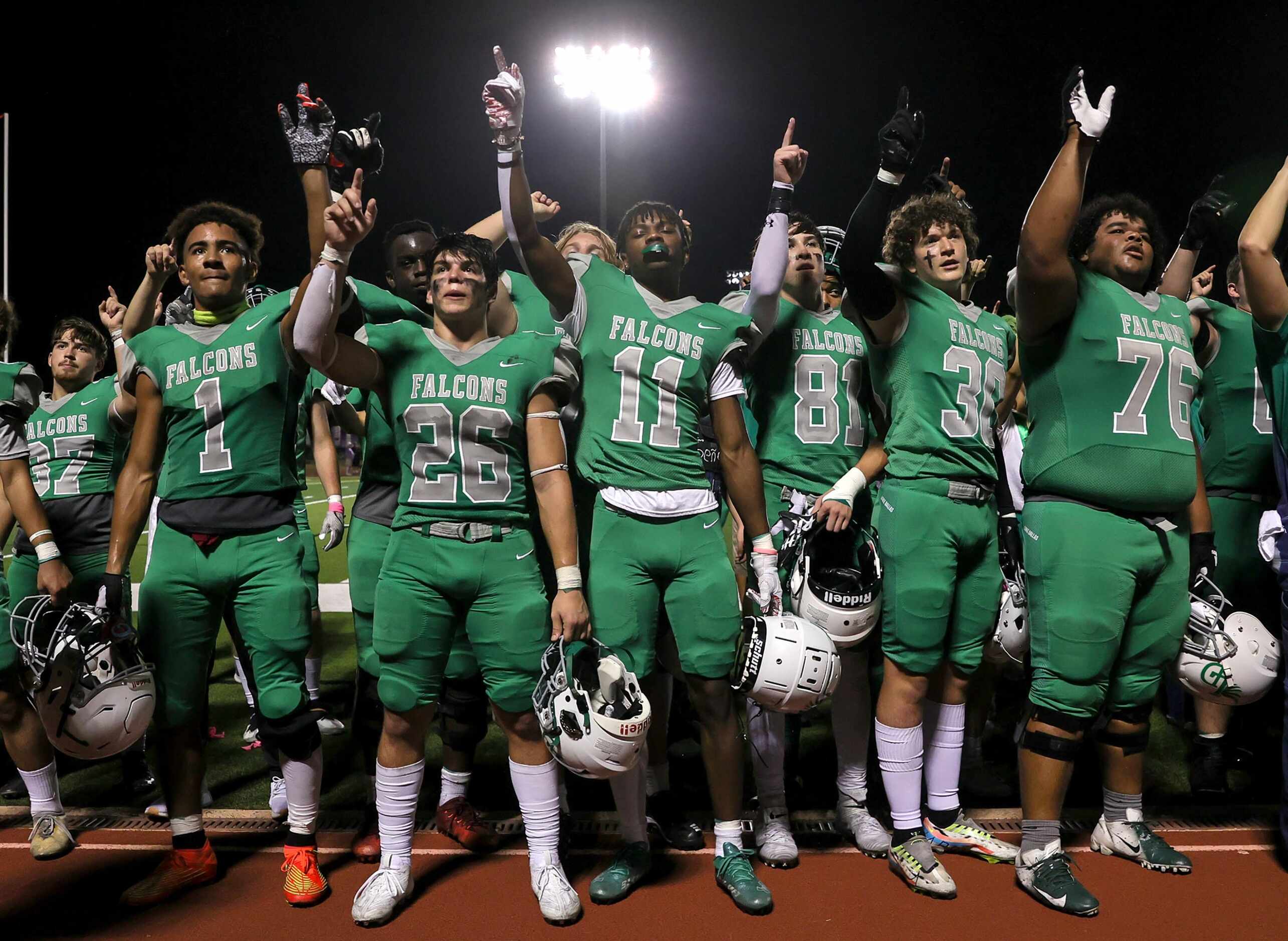 The Lake Dallas Falcons celebrate a victory over Denton, 31-14 to make the playoffs in a...