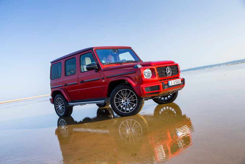 The newly redesigned Mercedes-Benz G 500, in hyacinth red metallic. One of the newly...