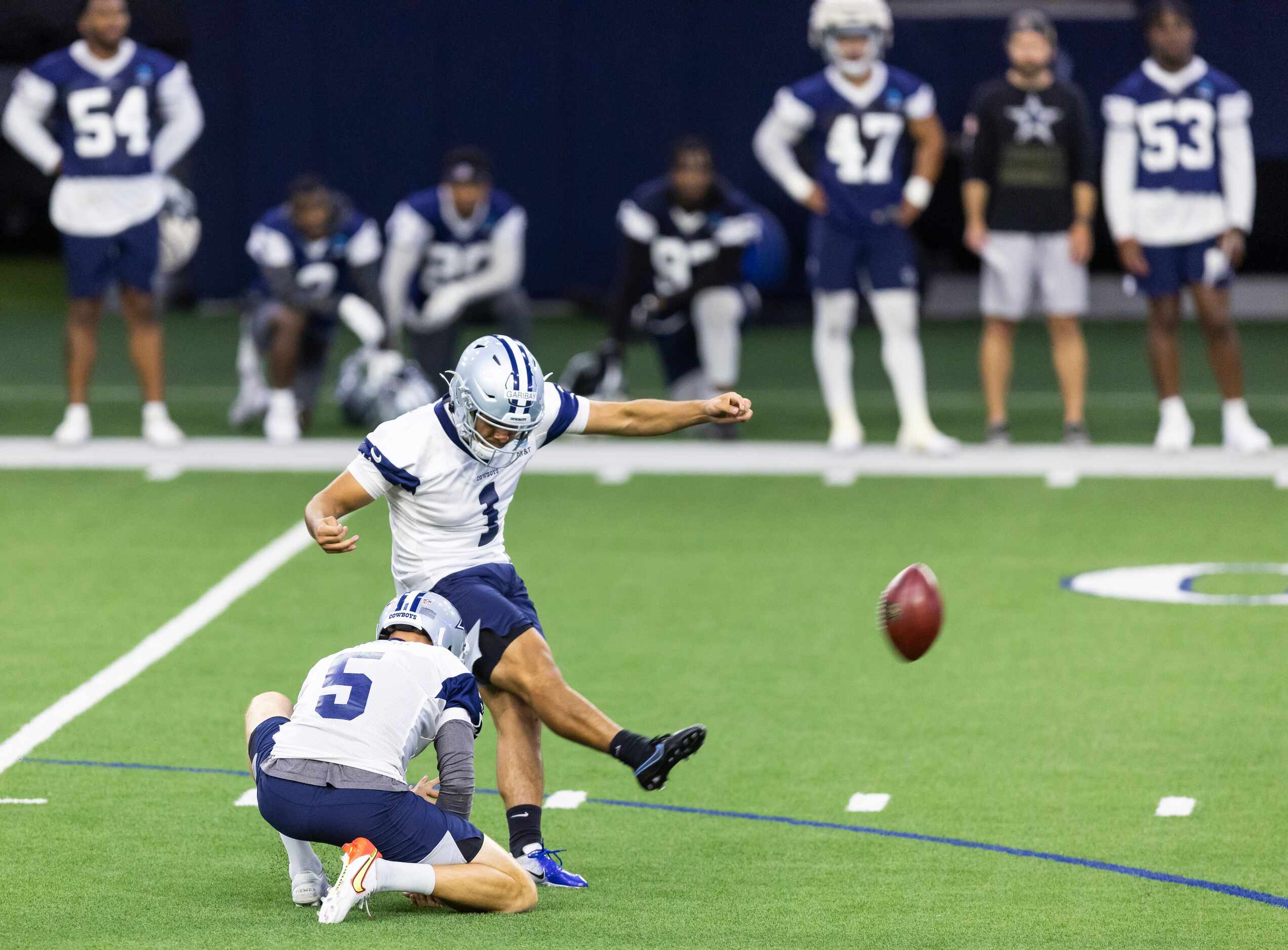Dallas Cowboys kicker Jonathan Garibay (1) kicks a field goal during a minicamp practice at...
