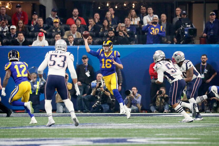 Los Angeles Rams quarterback Jared Goff (16) throws on first down in the fourth quarter...